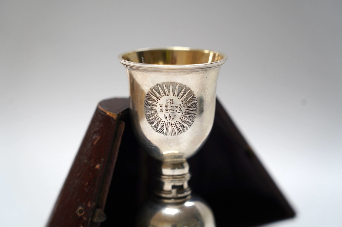 A cased late William IV silver communion chalice and patten, by Joseph & John Angell, London, 1836 (lacking locking piece?). Condition - poor